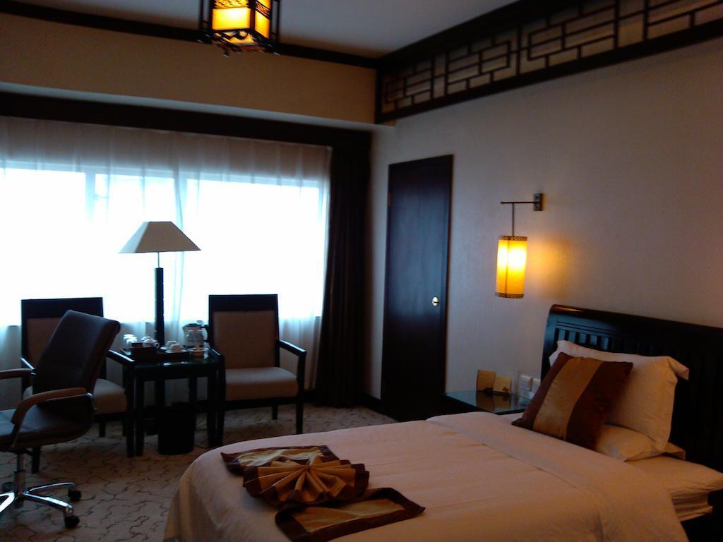 New Era Hotel Kunming Extérieur photo